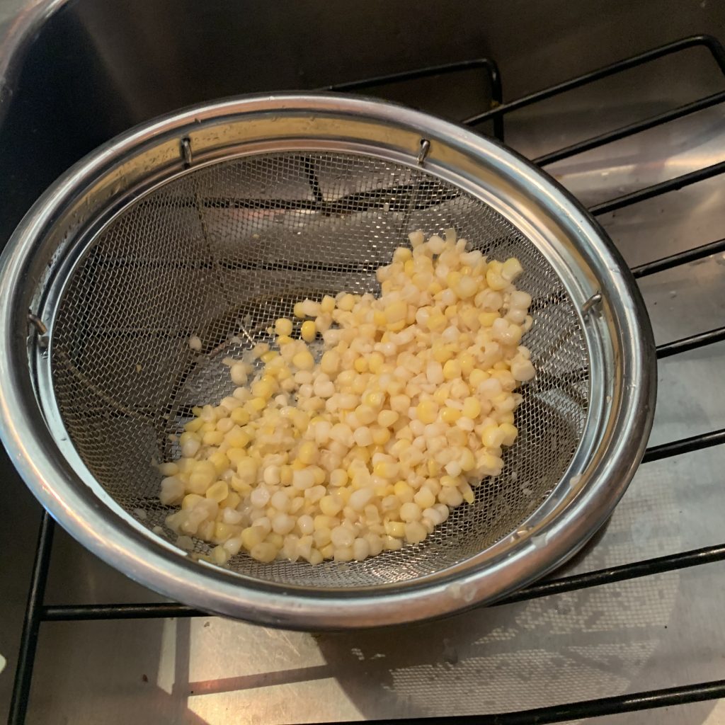rinse and thawing the frozen corn