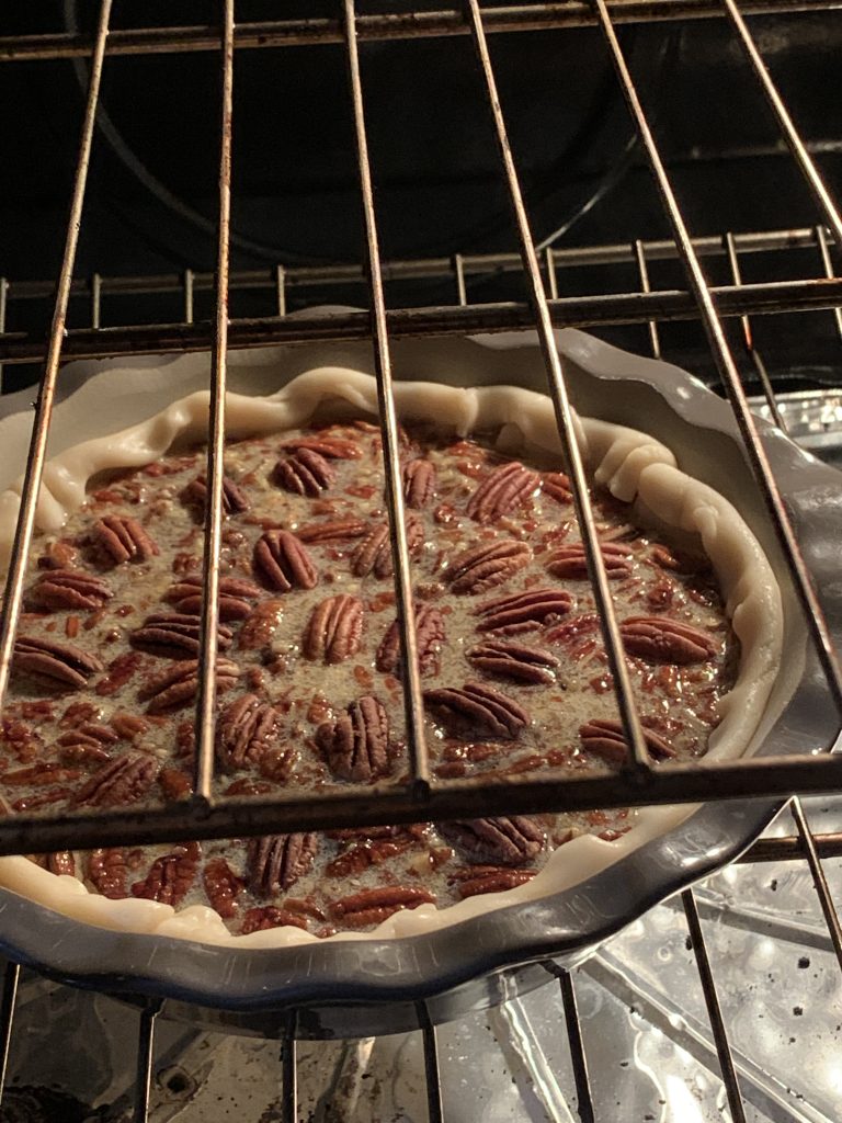 Pecan pie in oven
