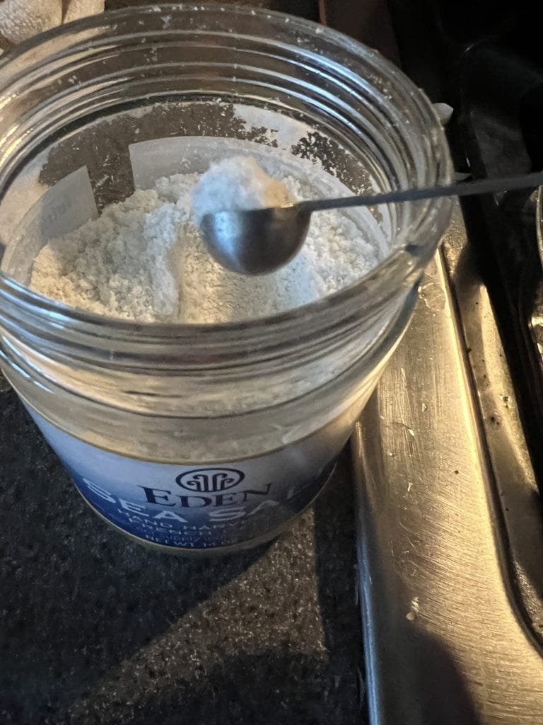 The 1/8 teaspoon scoop we use with it when cooking.